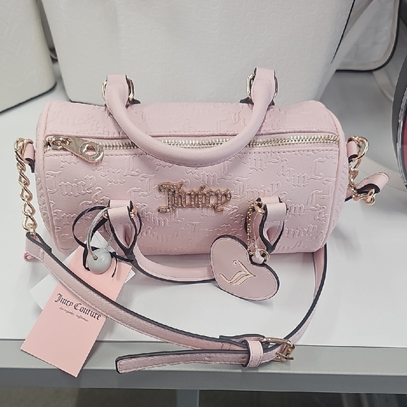Juicy Couture Handbags - Juicy Couture Pink Mini Bag with Gold Accents